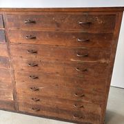 Large wooden workshop cabinet with 16 drawers, antique from the early 1900s.