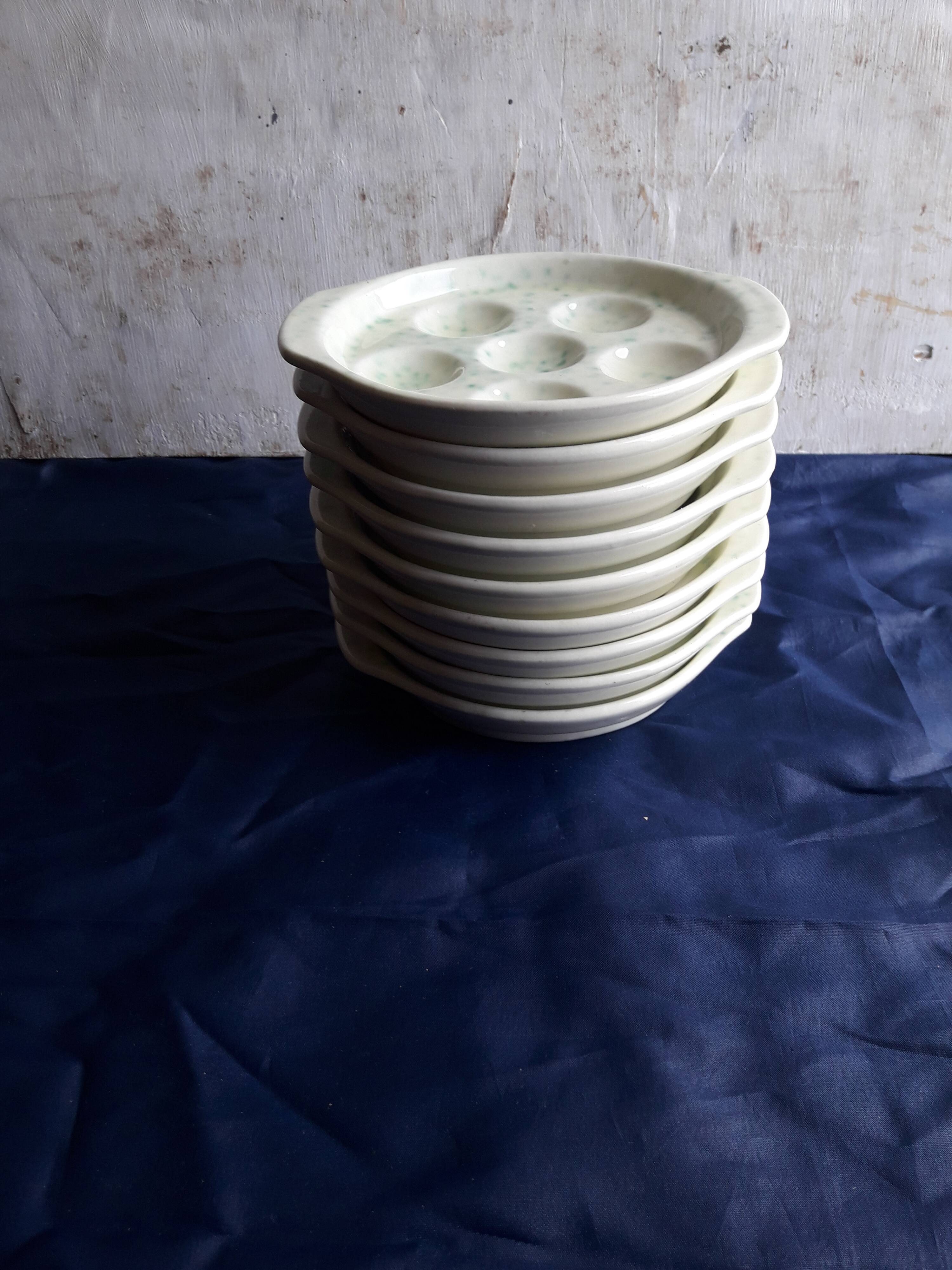 9 plates with 6 gien earthenware snails diam 14.5 cm
