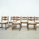 Set of six brutalist razorback dining chairs