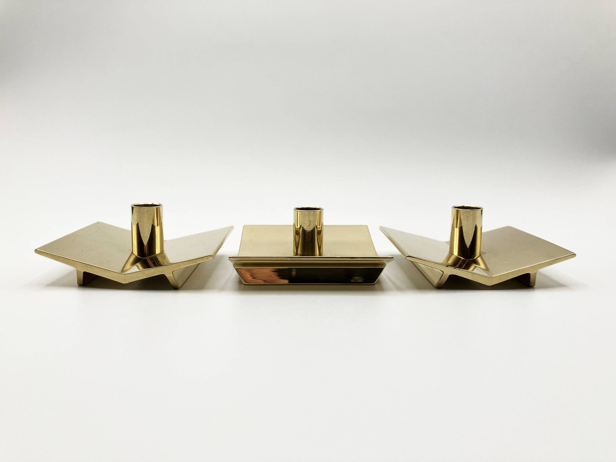 3 “Profile” candlesticks no. 70 in brass • Design Pierre Forssel for Skultuna Éditions • 1960