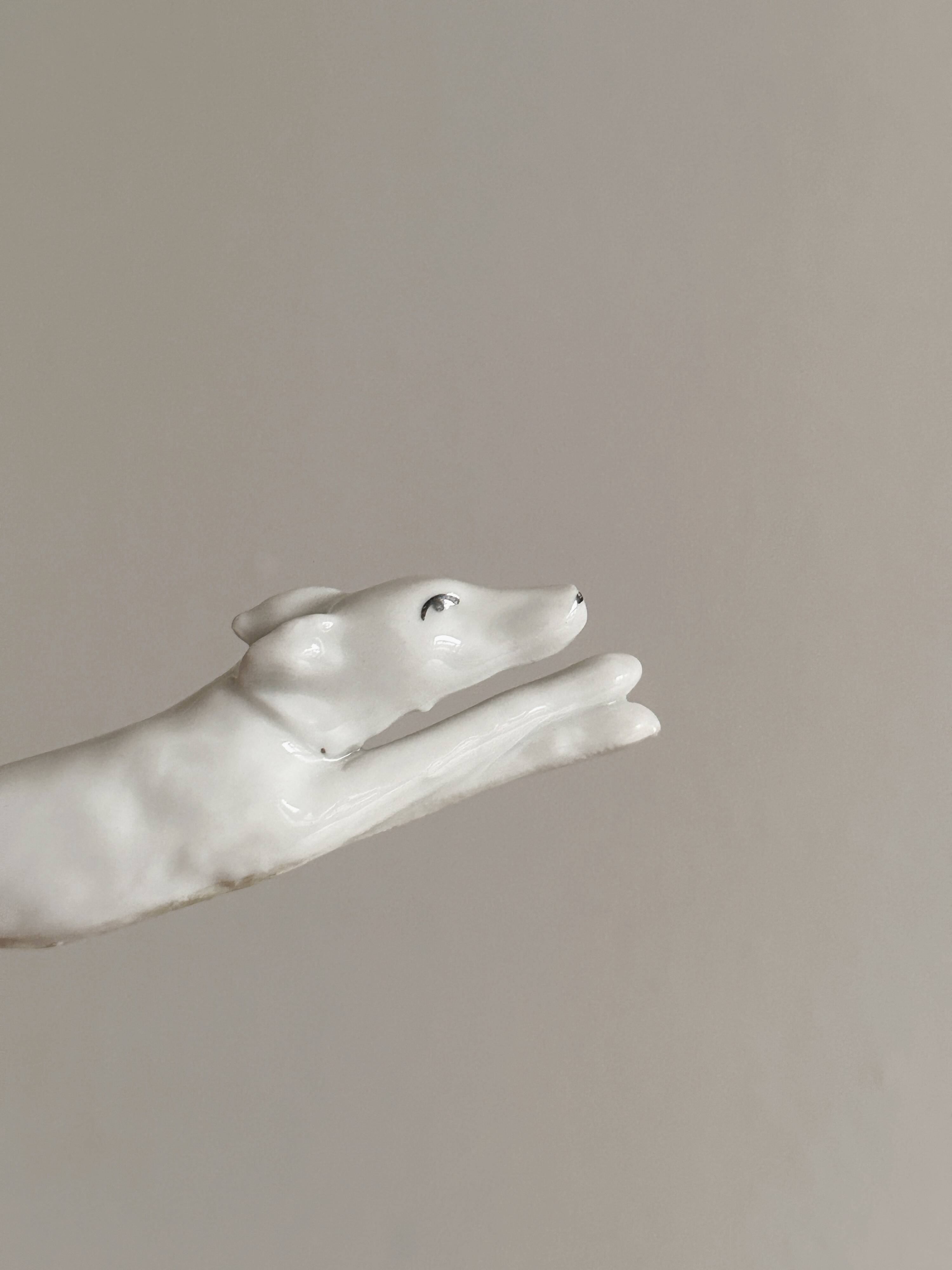 Porcelain animal knife holder.