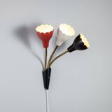 Adjustable wall lamp with three decorated shades in different colours
