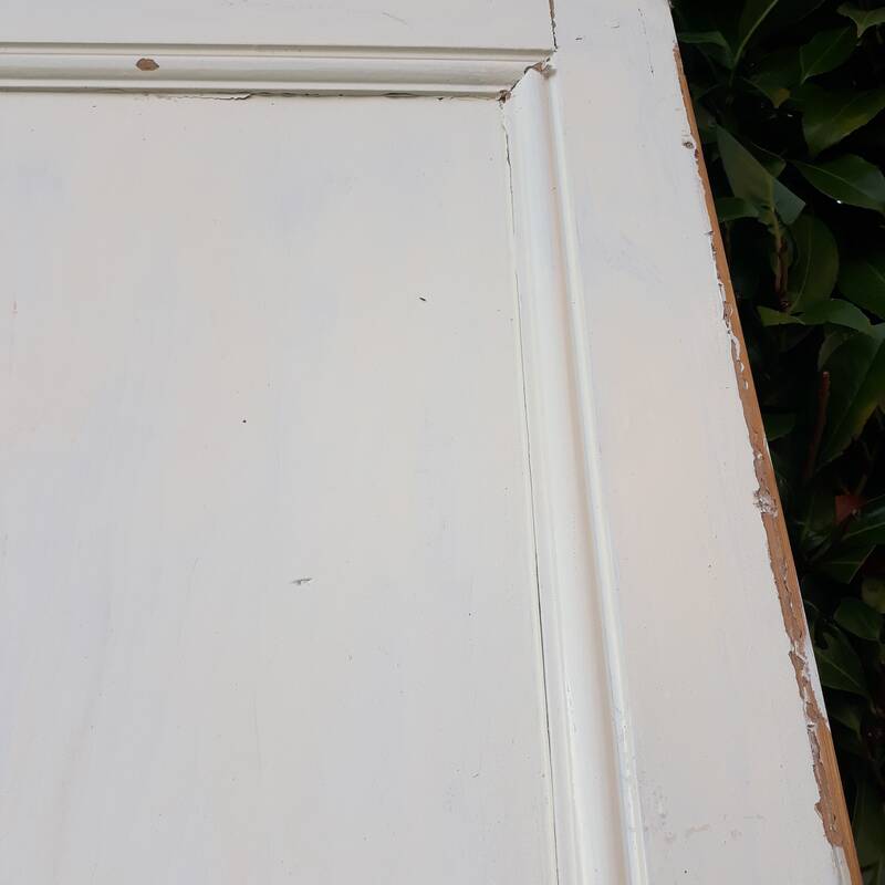 Communication door H220xW80.5cm, old panelled with moulding.