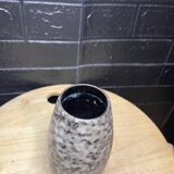 Ceramic vase with flower decor