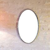 Oval art deco mirror with vintage chrome frame from the 70s