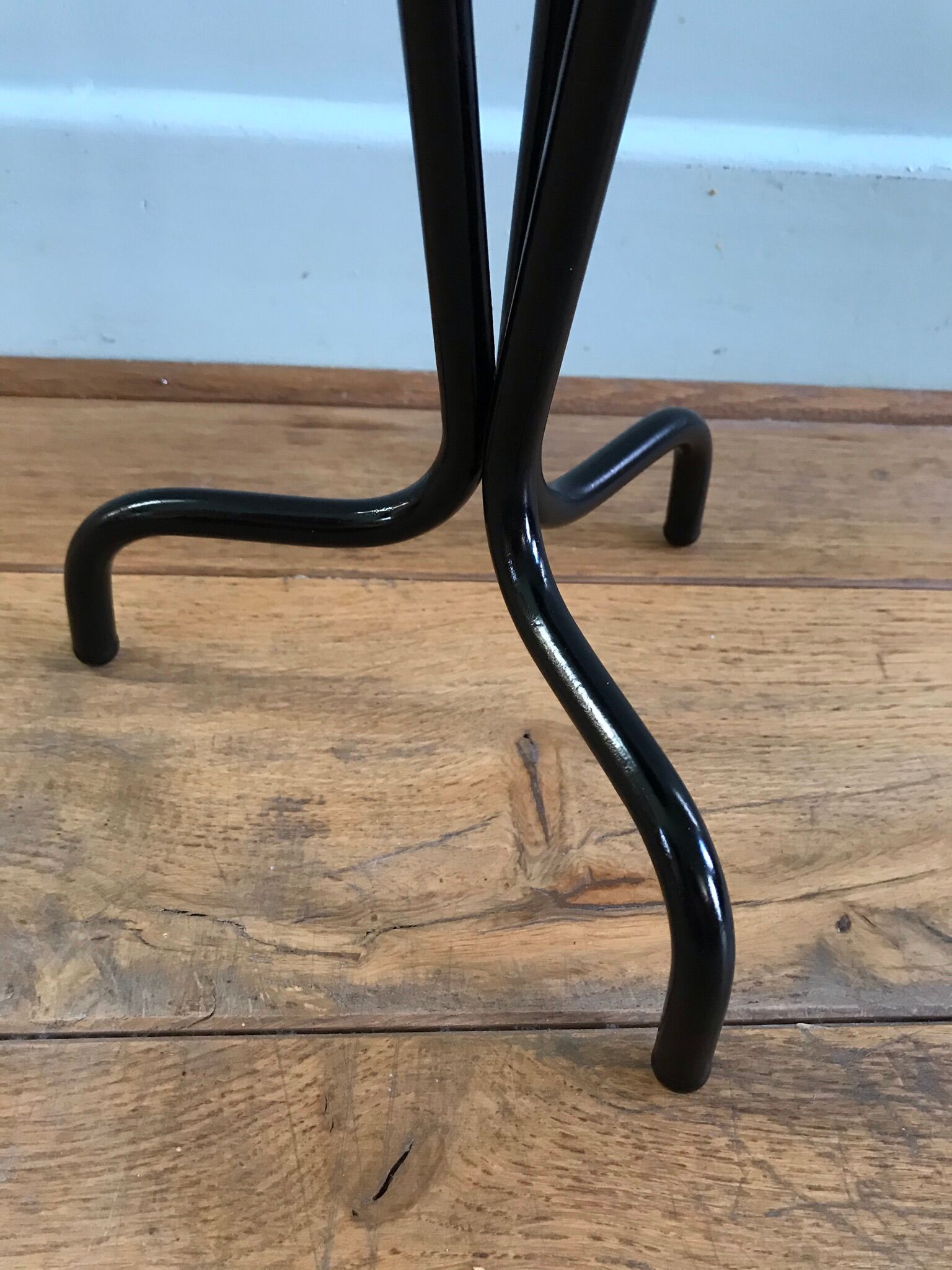 Vintage tripod harness round wooden top on black lacquered metal stand