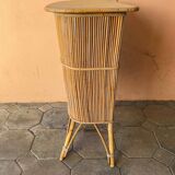 Vintage rattan bar from the 60s with rounded shapes and a shelf for glasses