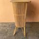 Vintage rattan bar from the 60s with rounded shapes and a shelf for glasses