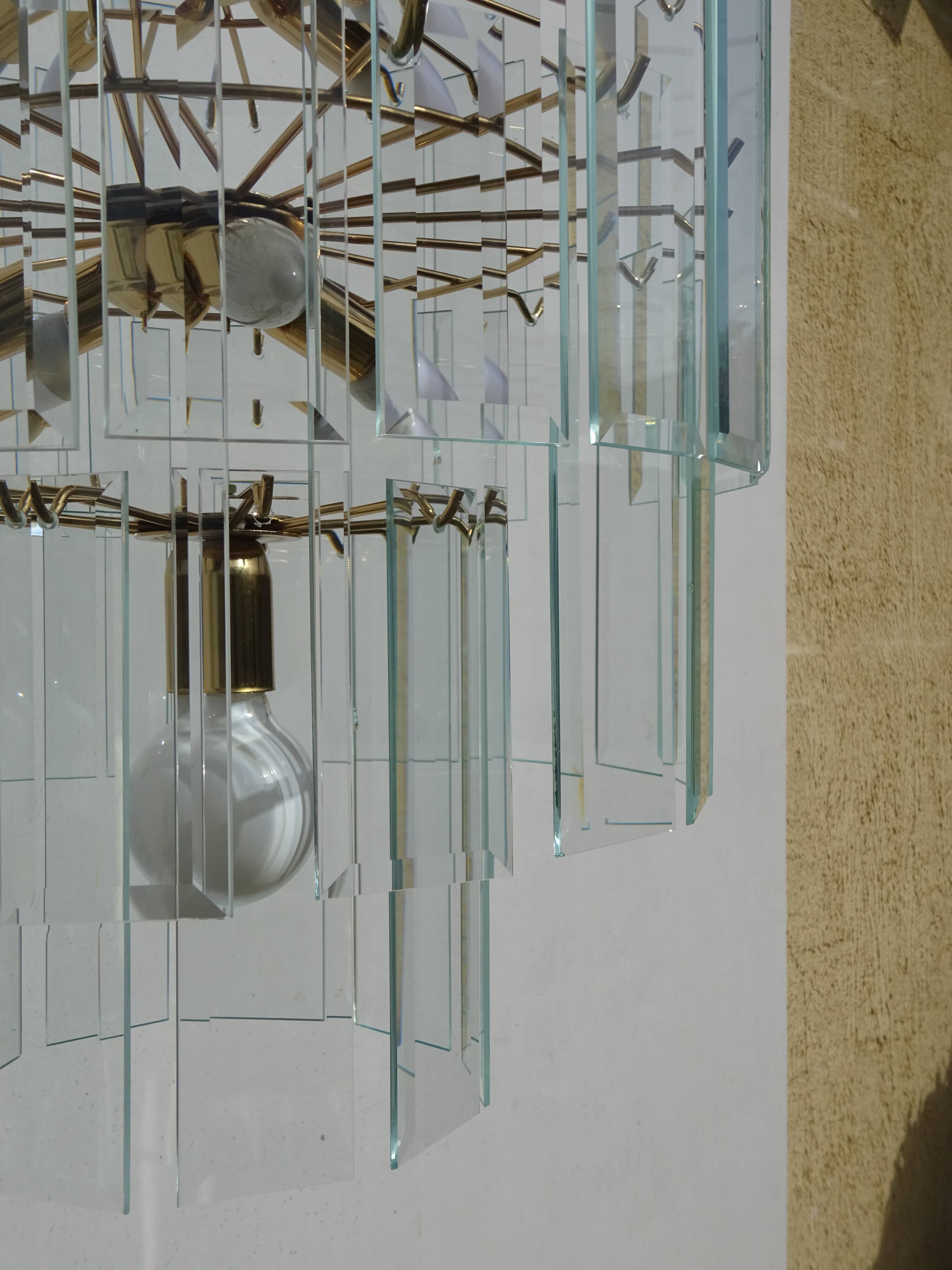 Brass chandelier and beveled glass, Italian manufacturing