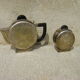 Set of a teapot and a silver metal sugar bowl