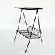 Side table with vintage metal and wood magazine holder