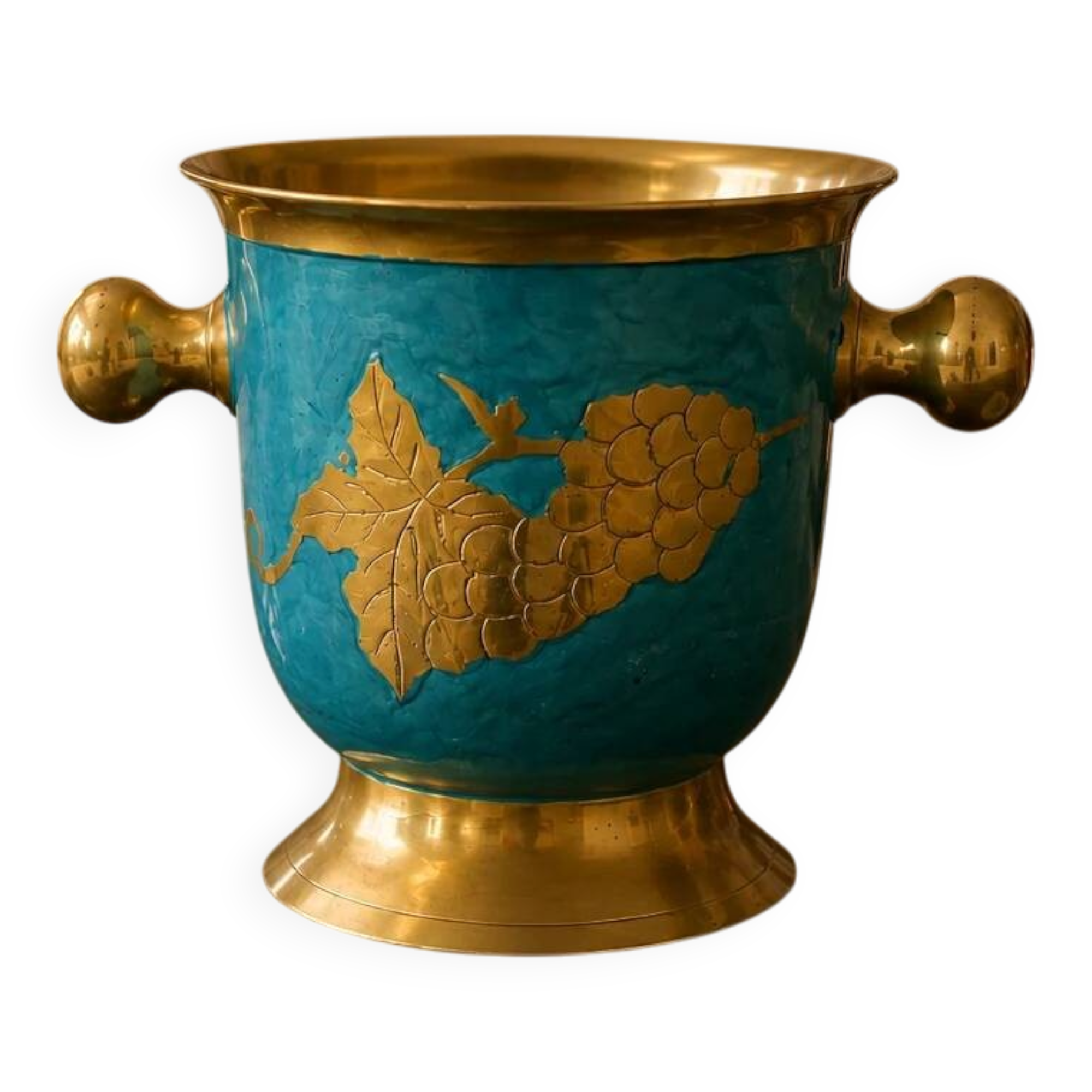 Vintage turquoise brass champagne bucket with grape decoration.