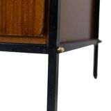 Pair of mahogany veneer and black lacquered iron cabinets. 1950s.