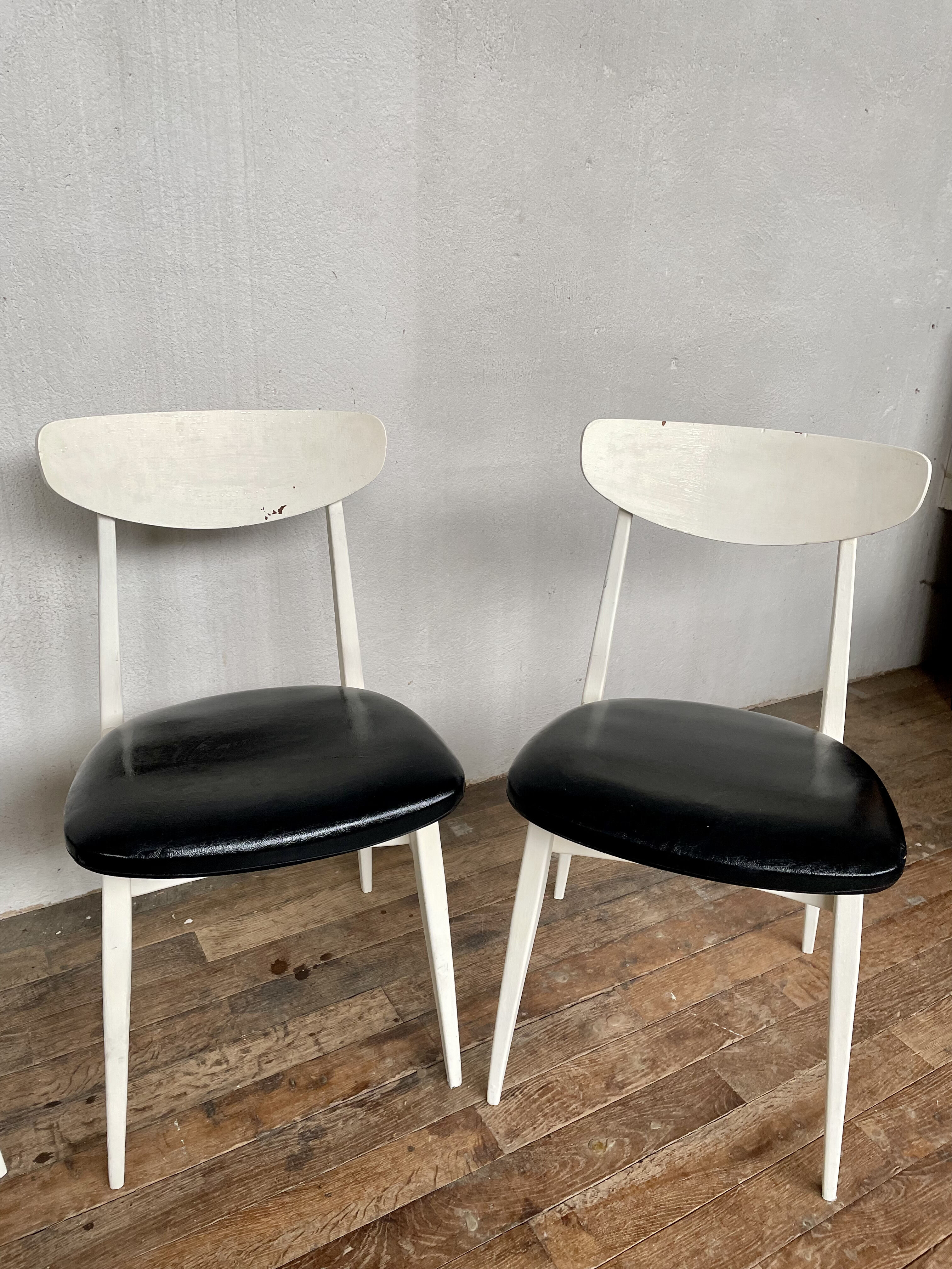 Series of 4 white and black Scandinavian chairs Ingrid from Stella 1960.