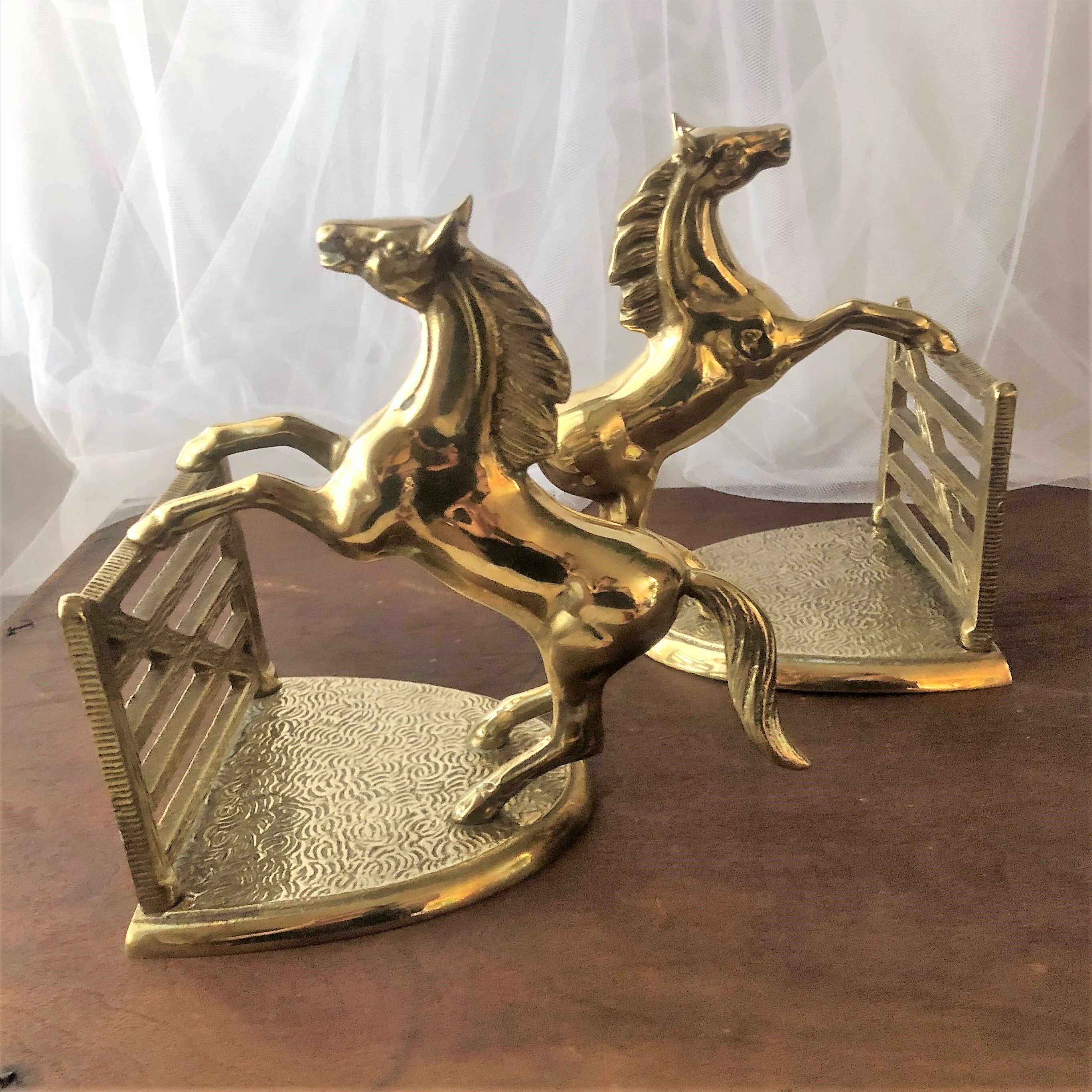 Goldeneye brass décor horses