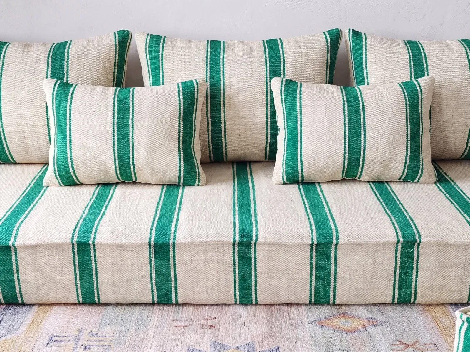Emerald striped Moroccan living room set with pouf.