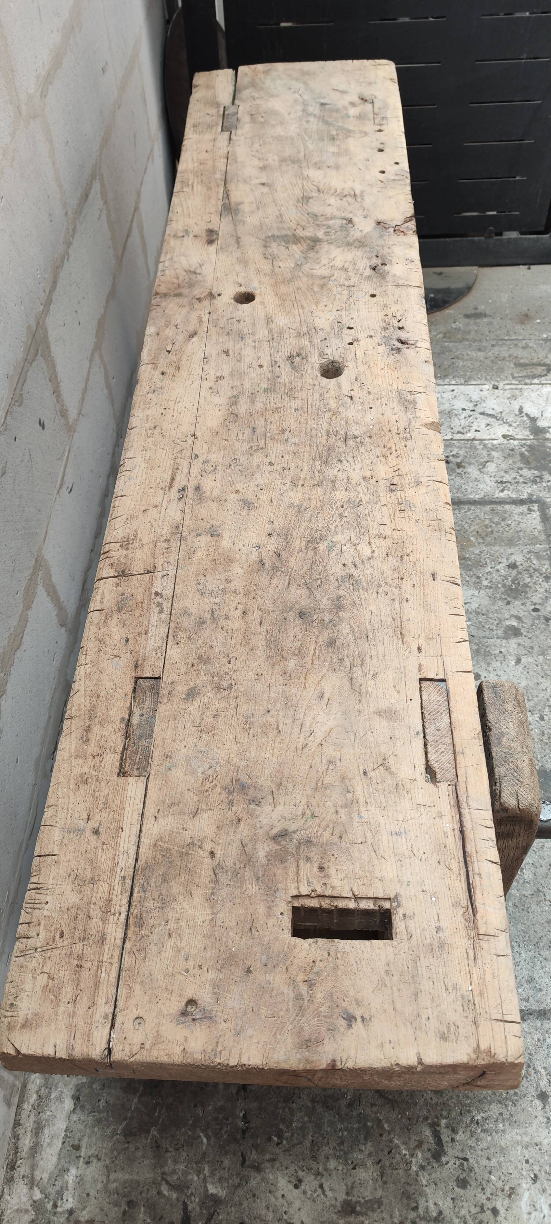 Old carpenter's workbench with eight metal drawers, industrial console
