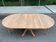 Table à manger ronde extensible décapée en merisier massif brut pied centra