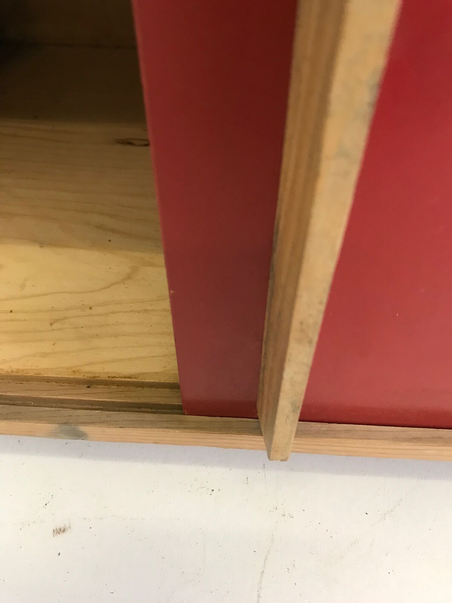 Vintage furniture with red sliding doors