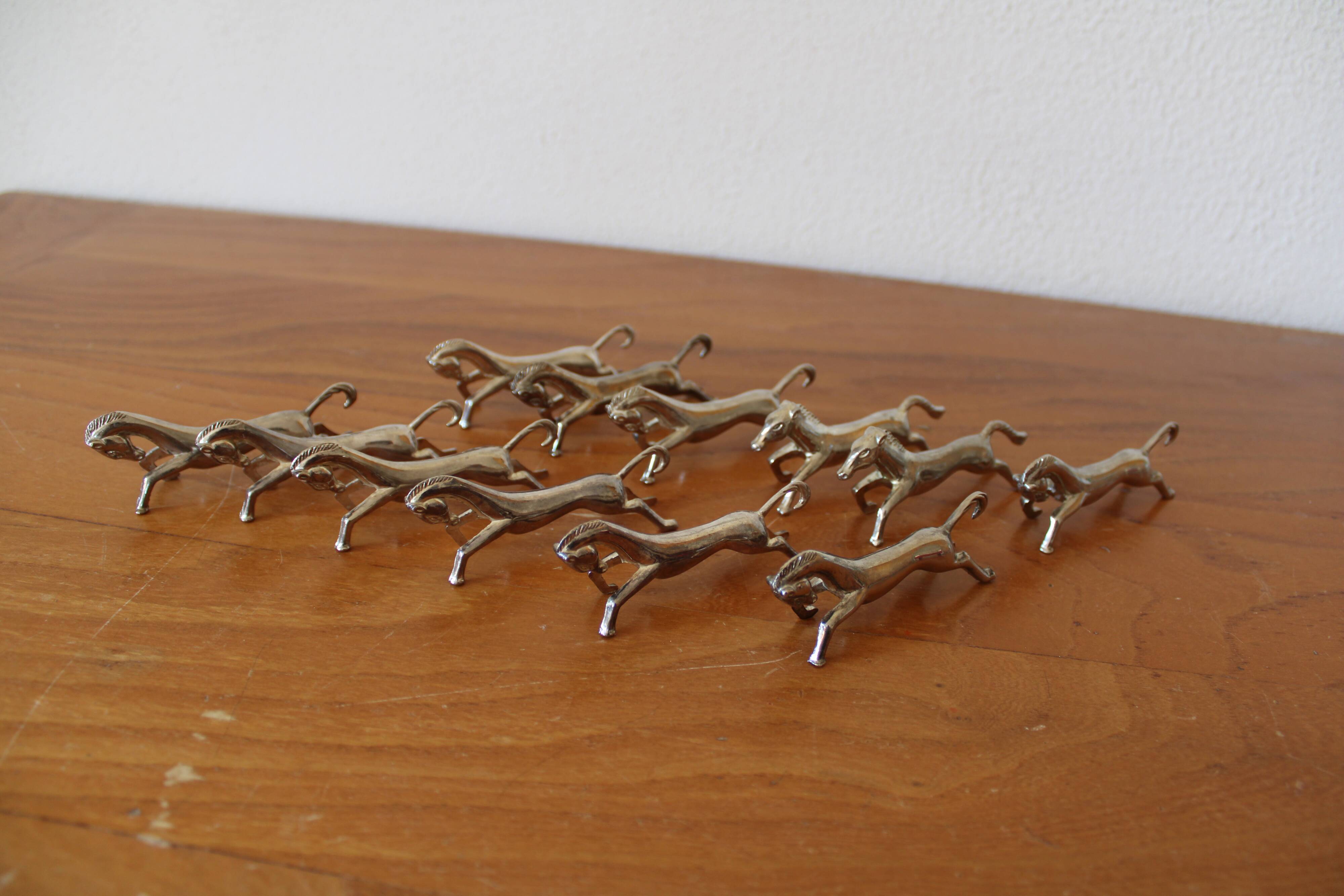 Set of 12 vintage knife rests, in silver metal