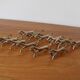 Set of 12 vintage knife rests, in silver metal