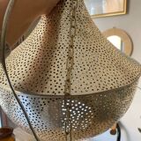 Perforated metal chandelier