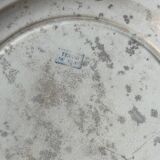 Plat rond en terre de fer à décor d'oiseaux