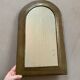 Bronze arch mirror