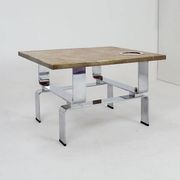 Acid-etched brass coffee table top by Christian Krekels with an agate stone