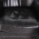 Pair of small leather club armchairs