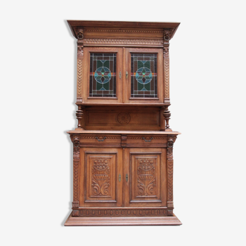 Double-body Henri II style in worked oak, original stained glass windows with lead