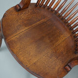 Pair of English Edwardian Oak Spindle Back Captains Office Desk Chairs