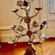 Antique metal candlestick with floral decoration – Mexico