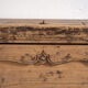 Low Shanxi cabinet in elm with carved door – China, circa 1930