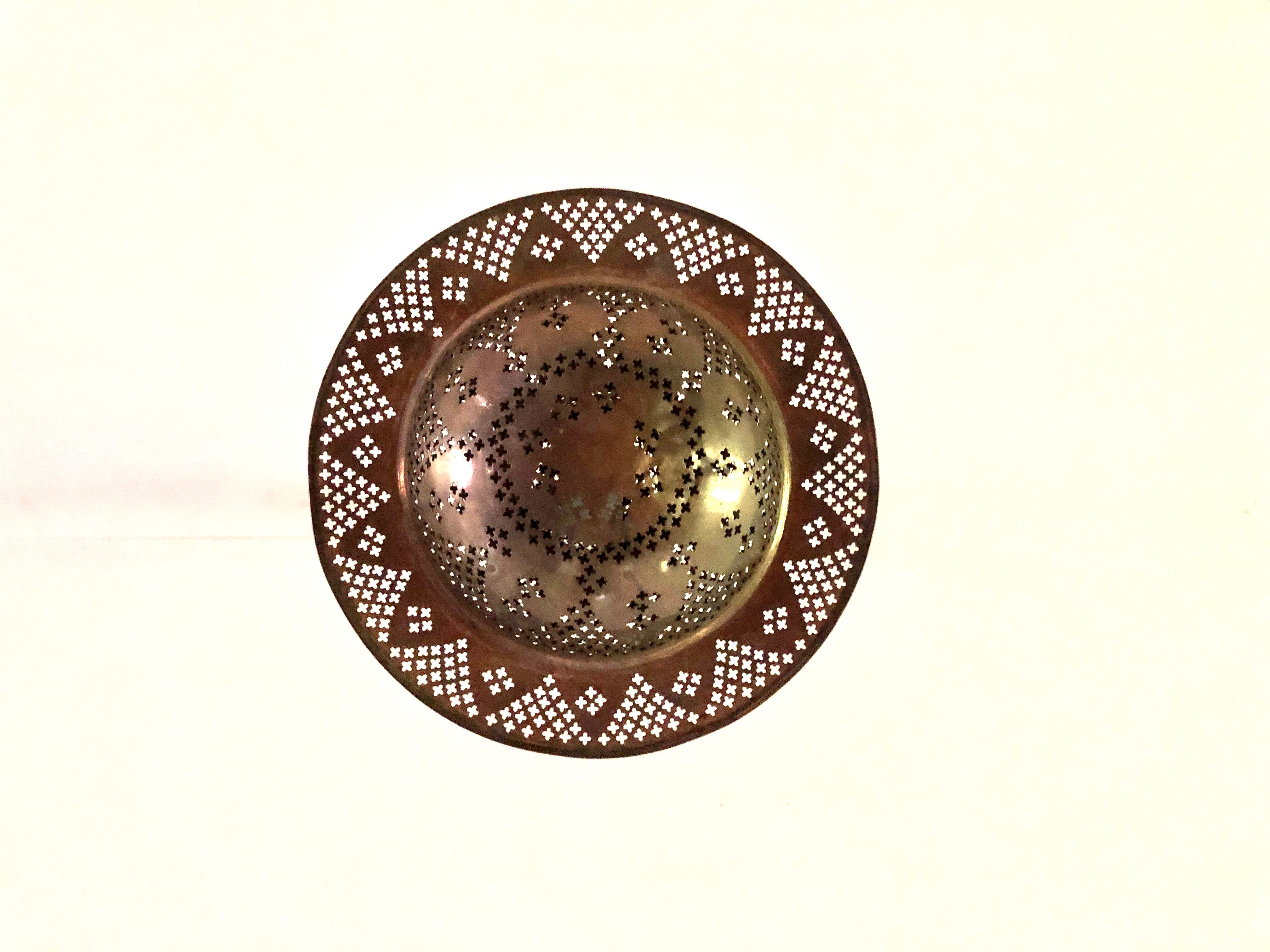 Perforated gilded metal lantern