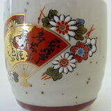 Far Eastern porcelain sake service consisting of a carafon and six cups