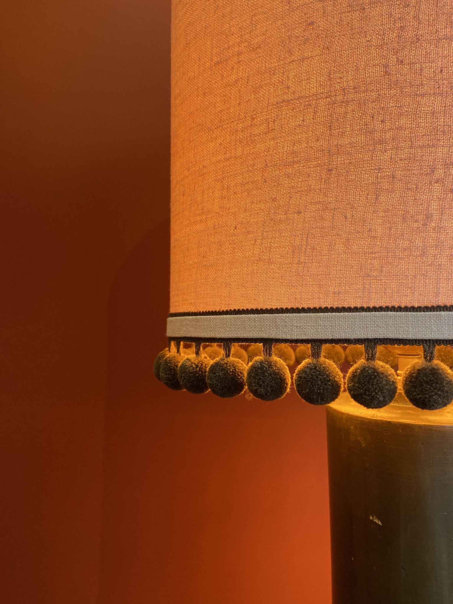 Copper "bouillotte" lamp with Ashoka Silk shade, pom-poms of c