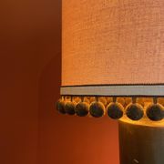 Copper "bouillotte" lamp with Ashoka Silk shade, pom-poms of c