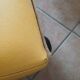 Set of 4 vintage 70s/80s armchairs in mustard yellow faux leather.