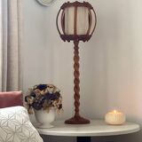 Turned wood lamp.