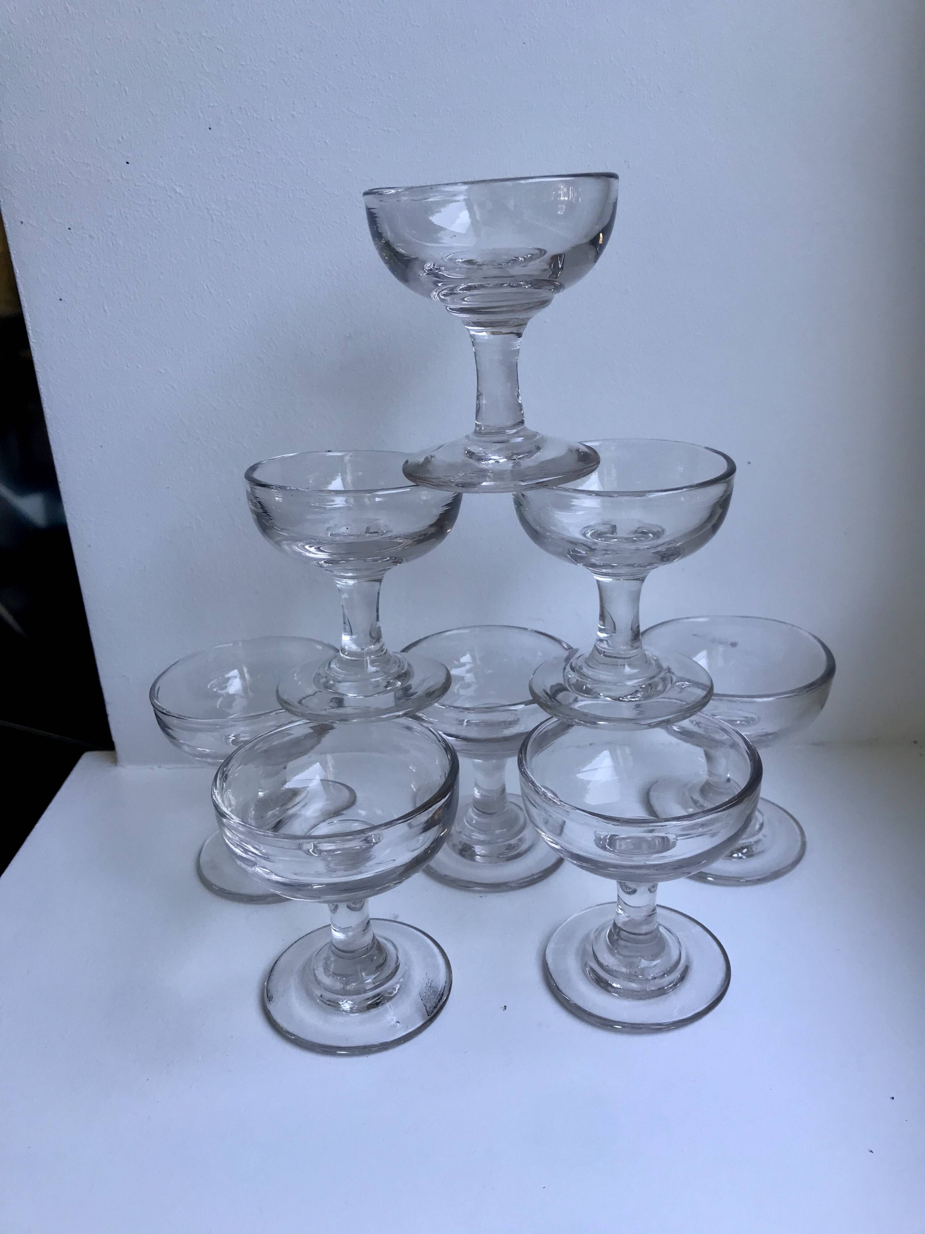 set of 9 small molded glass shot glasses early twentieth century