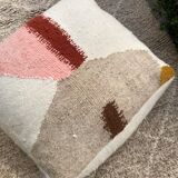Woven wool pouf