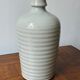 Old Japanese sake bottle in tokkuri shape.