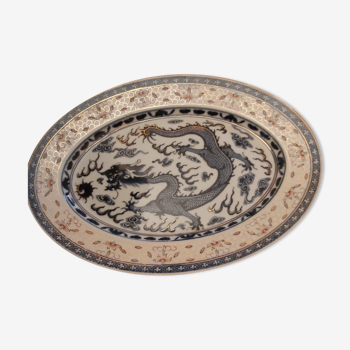 Plat ovale en porcelaine chinoise dite graine de riz des années 1960