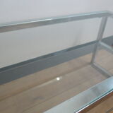 Coffee table in glass and chromed metal