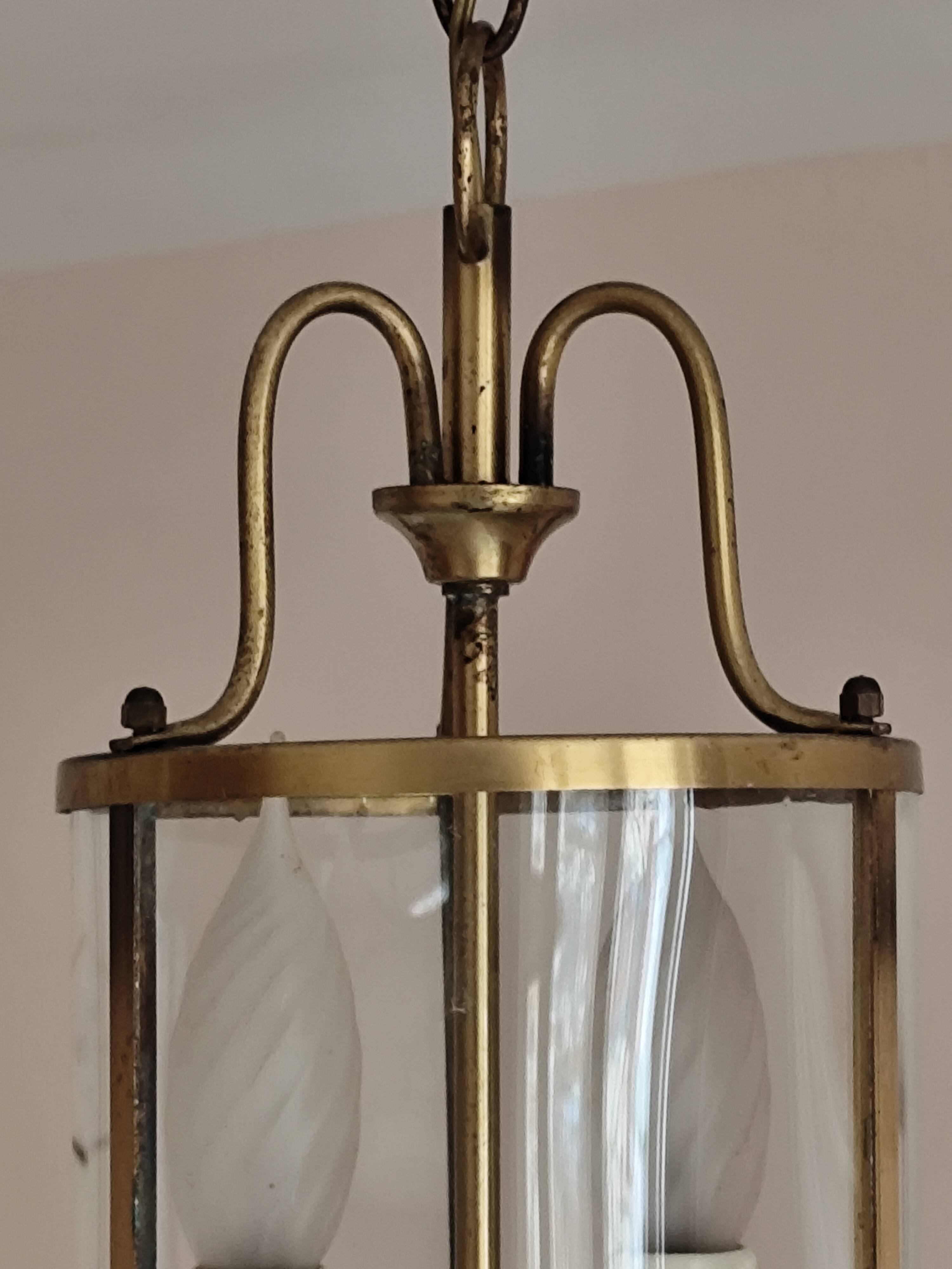 Cylindrical brass and glass lantern in Louis XVI style.