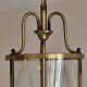 Cylindrical brass and glass lantern in Louis XVI style.