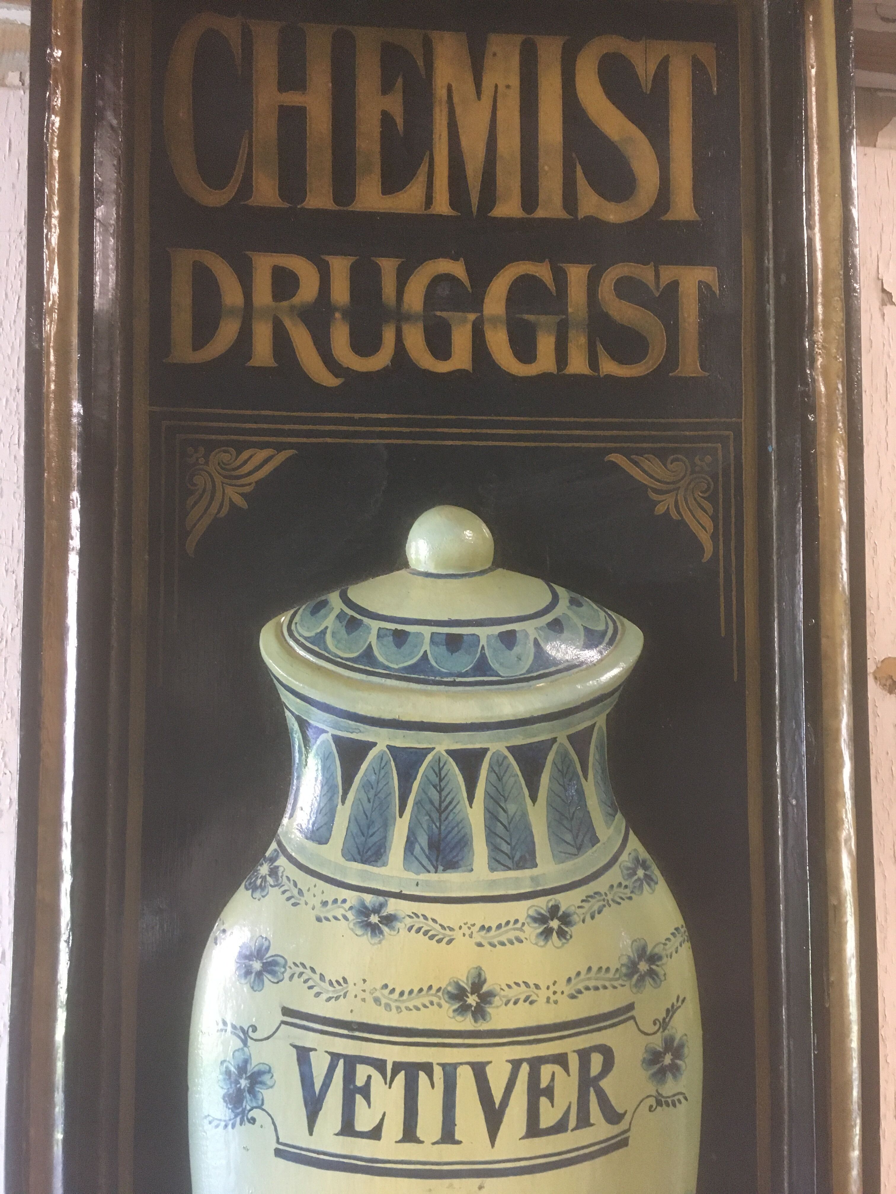 Wooden relief panel "Chemist Druggist" from Country corner