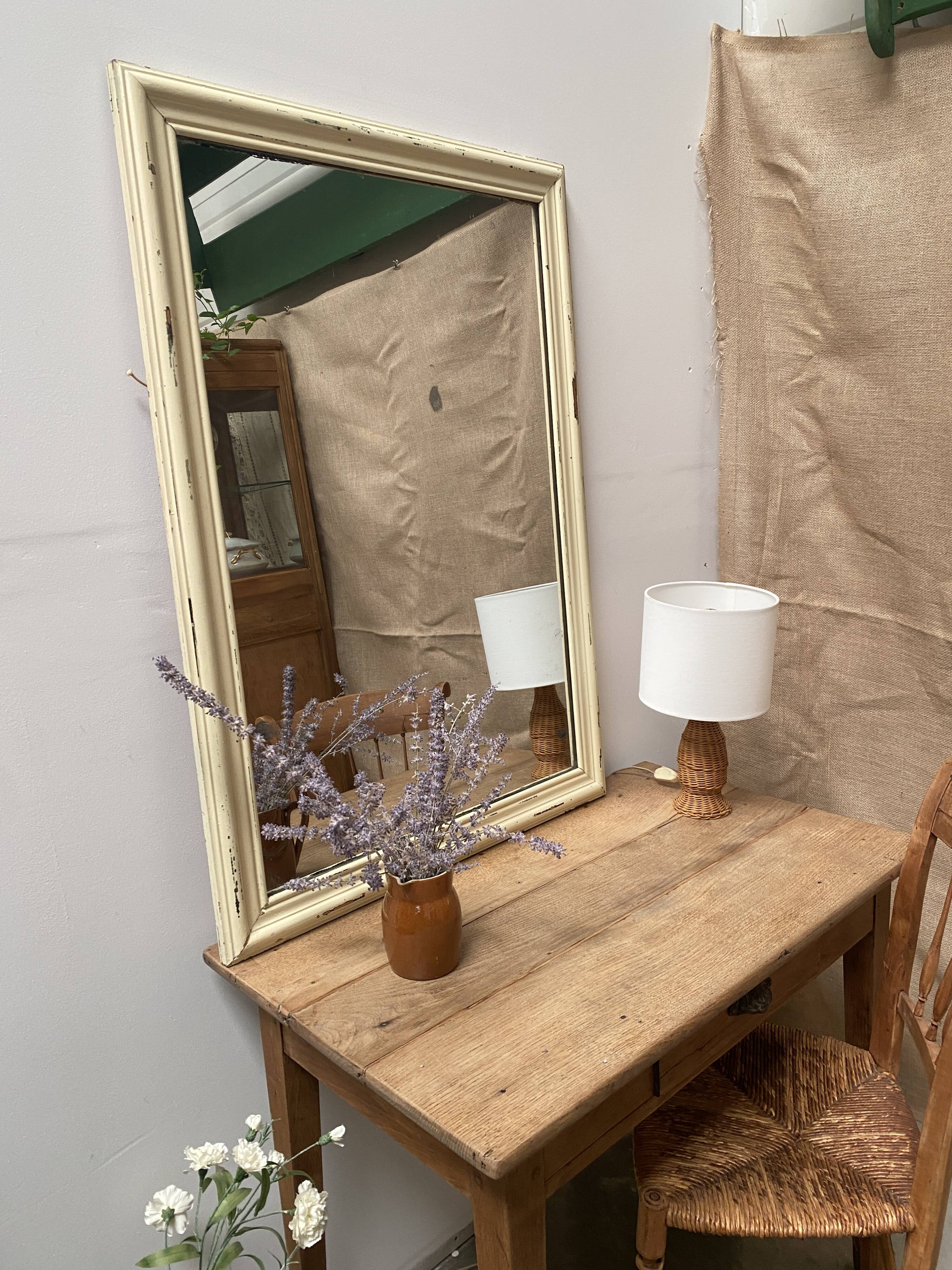 Antique mirror with beige patina