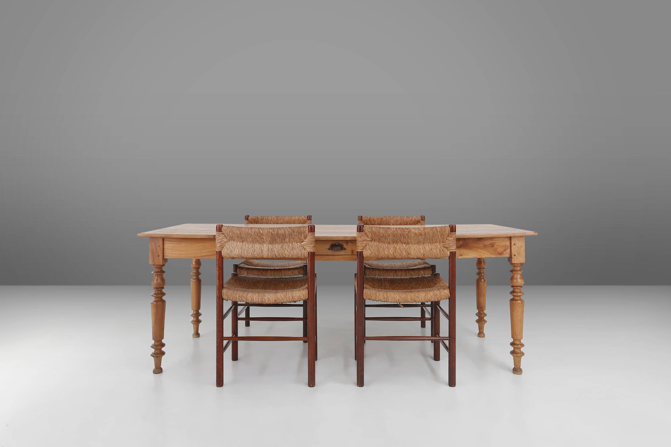 Wabi sabi style French dinner table in elm wood with drawer, ca. 1850